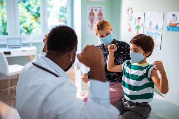 image of a doctor and child